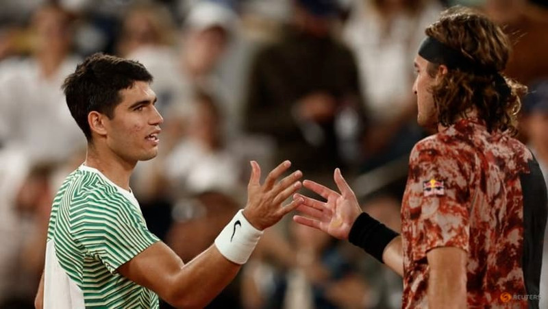 Tennis - French Open - Roland Garros, Paris, France - June 6, 2023 Spain's Carlos Alcaraz shakes hands with Greece's Stefanos Tsitsipas after winning his quarter final match. (Photo: Reuters)