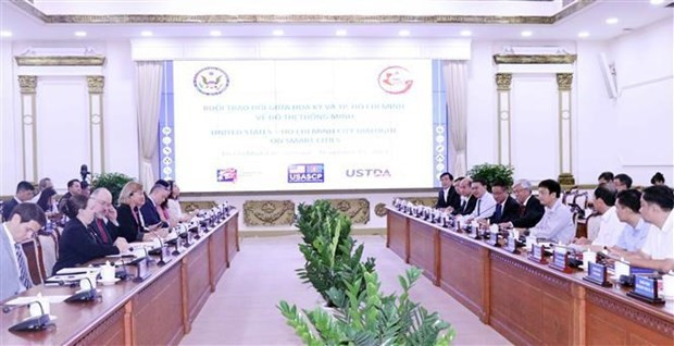 Participants at the meeting. (Photo: VNA)