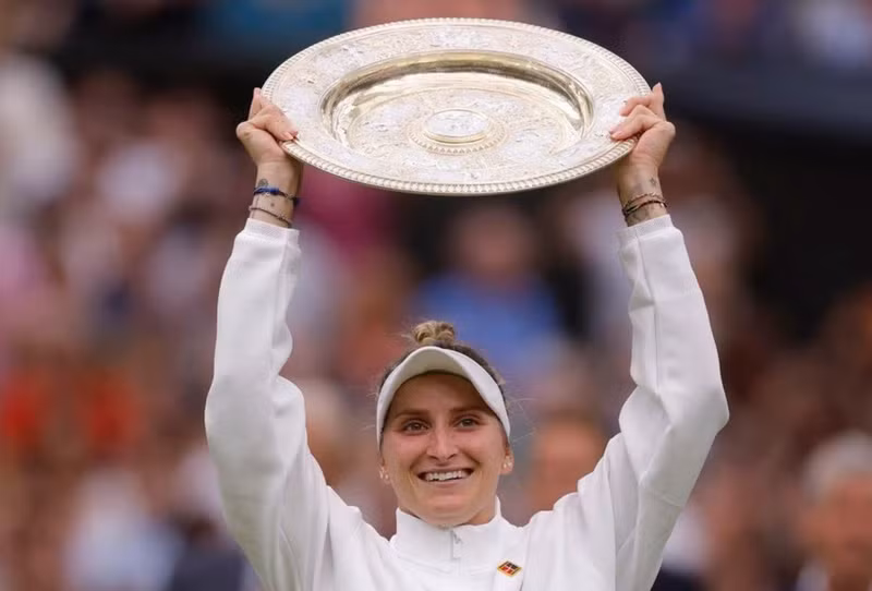 Unseeded Vondrousova stuns Jabeur to win Wimbledon title