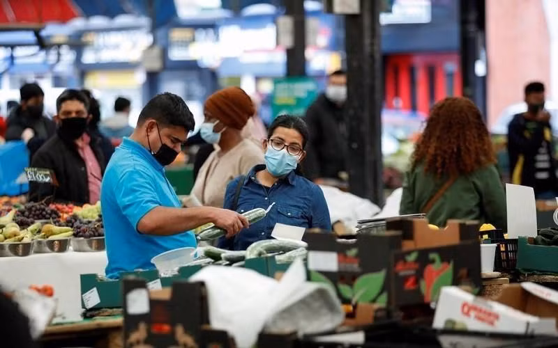 People shop at Leicester market, Leicester City, the UK, May 27, 2021. (Photo: Reuters)