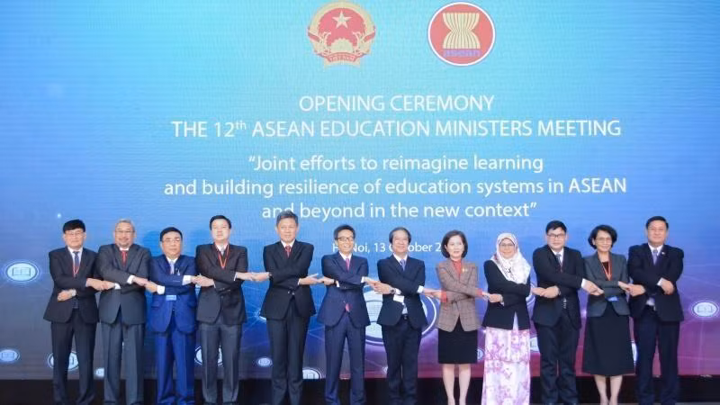 Delegates pose for a group photo.