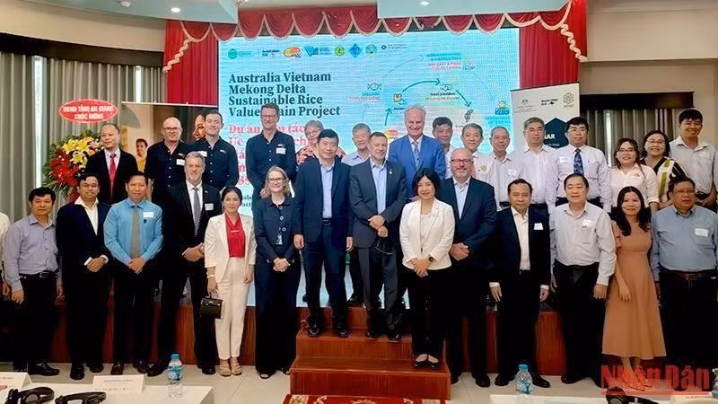 Delegates pose for a group photo at the launch ceremony.