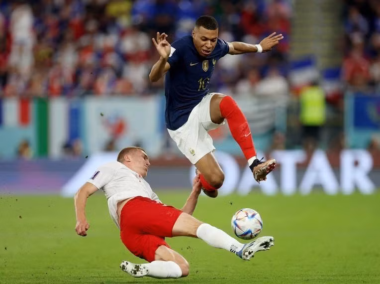 Denmark’s Rasmus Kristensen in action with France’s Kylian Mbappe. (Photo: Reuters)