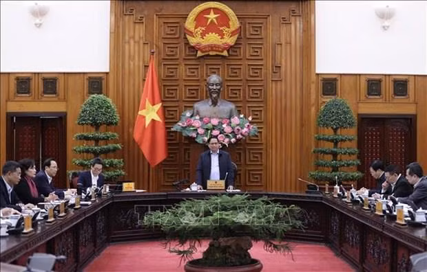 PM Pham Minh Chinh addresses the meeting in Hanoi on December 6. (Photo: VNA)