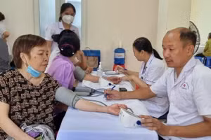 Doctors from Phong Tho General Hospital provide free health examinations for residents on June 2.