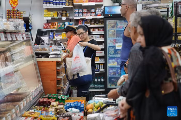 Customers shop at a store in New York, the United States, on Aug. 12, 2026. The U.S. consumer price index (CPI) rose 3.4 percent year on year in July, slightly lower than 3.5 percent in June, according to data released by the U.S. Bureau of Labor Statistics (BLS) on Wednesday. (Xinhua)