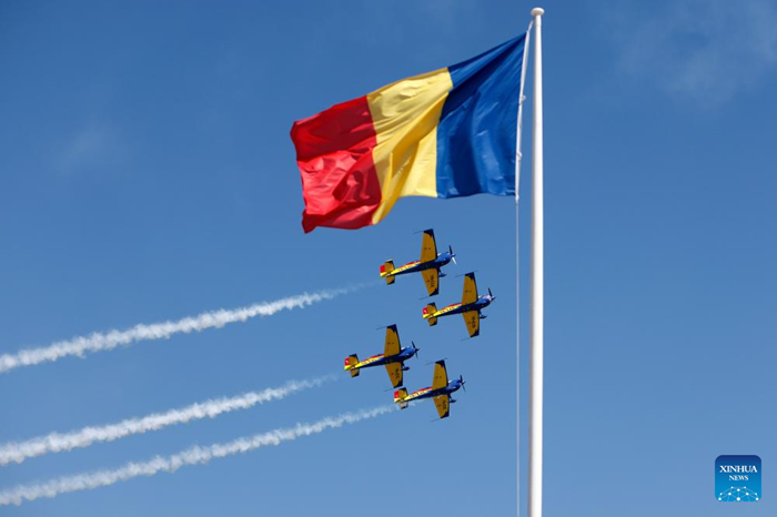 Members of Hawks of Romania aerobatic team perform on Extra-330 airplanes during the Bucharest International Air Show 2025 (BIAS), held at Baneasa airfield in Bucharest, Romania, Aug. 30, 2025. Over 100 civil and military aircraft, as well as over 200 pilots and paratroopers participate in the 15th edition of BIAS, Romania's largest air show. (Photo: Xinhua)