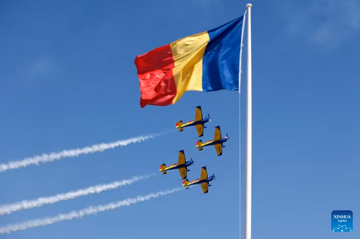 Members of Hawks of Romania aerobatic team perform on Extra-330 airplanes during the Bucharest International Air Show 2025 (BIAS), held at Baneasa airfield in Bucharest, Romania, Aug. 30, 2025. Over 100 civil and military aircraft, as well as over 200 pilots and paratroopers participate in the 15th edition of BIAS, Romania's largest air show. (Photo: Xinhua)