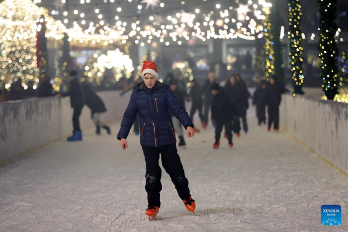 People skate at the Ala-Too Square during a New Year event in Bishkek, Kyrgyzstan, Dec. 23, 2025. (Photo: Xinhua)
