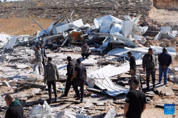 People check the rubble of commercial shops demolished by Israeli military bulldozers in south of the West Bank city of Hebron, Nov. 26, 2025. (Photo: Xinhua)