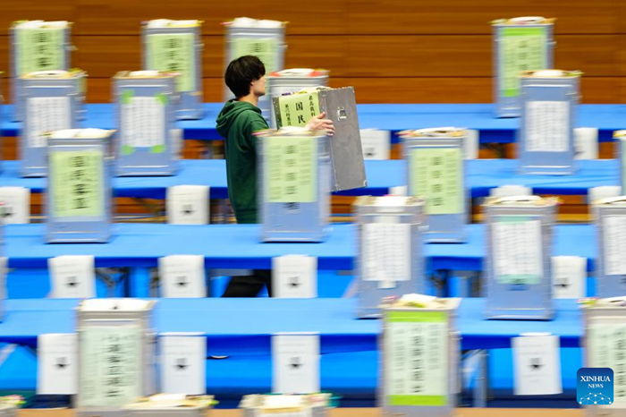 A staff member works at a counting station for the general election in Tokyo, Japan, Feb. 8, 2026. Japan's ruling coalition of Liberal Democratic Party (LDP) and its partner Japan Innovation Party is expected to secure a majority of seats in the House of Representatives in Sunday's general election, public broadcaster NHK said, citing its exit poll. (Photo: Xinhua)