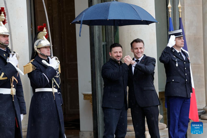 French President Emmanuel Macron (2nd R) greets Ukrainian President Volodymyr Zelensky (3rd R) at the Elysee Palace in Paris, France, March 13, 2026. (Photo: Xinhua)