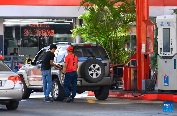 A man buys gasoline at a gas station belonging to the Petroleums of Venezuela, S.A., in Caracas, Venezuela, Jan. 8, 2026. (Photo: Xinhua)