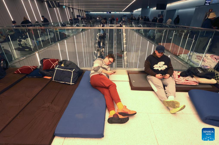 People spend the night on a platform of a subway station in Ramat Gan, Israel, on March 11, 2026. Alarms were activated across Israel on Wednesday night as air defenses detected missiles and rockets launched from Iran and Lebanon. (Photo: Xinhua)