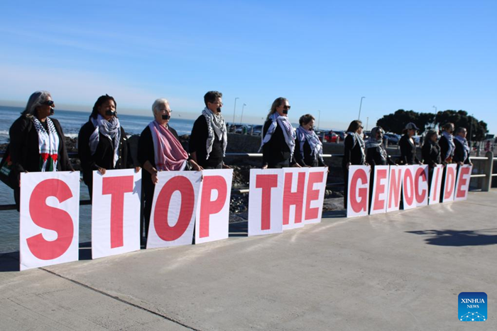 People hold a silent protest against mass starvation and genocide in Gaza, in Sea Point, Cape Town, South Africa, Aug. 2, 2025. (Photo: Xinhua)