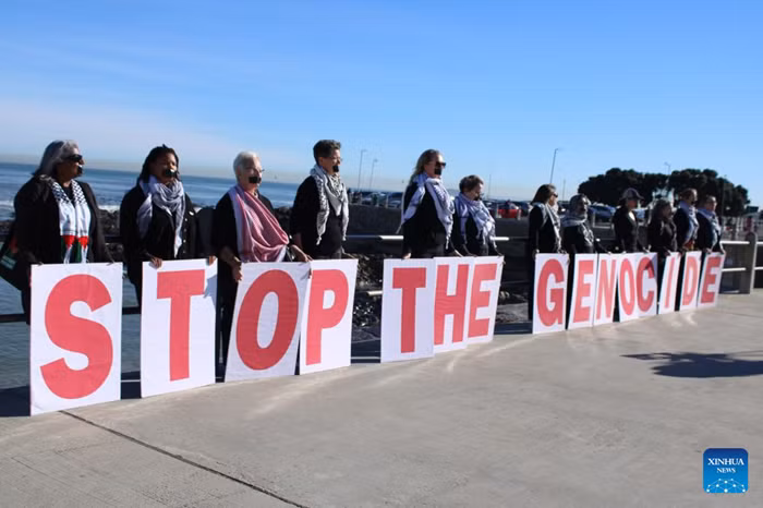 People hold a silent protest against mass starvation and genocide in Gaza, in Sea Point, Cape Town, South Africa, Aug. 2, 2025. (Photo: Xinhua)