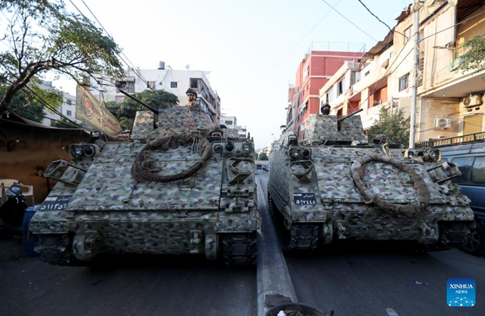 Lebanese army members oversee the handover of a batch of weapons from the Palestinian camps at the Burj Barajneh camp in Beirut, Lebanon, on Aug. 21, 2025. Lebanon on Thursday started transferring weapons from Palestinian camps in the country to the Lebanese army at the Burj Barajneh camp, according to Ramez Dimechkie, head of the Lebanese-Palestinian Dialogue Committee. (Photo: Xinhua)