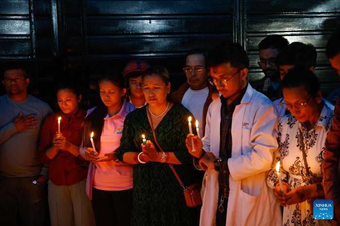 People attend a candlelight vigil for victims of protests over the previous days in Kathmandu, Nepal, Sept. 11, 2025. A peaceful rally turned violent in Kathmandu and other parts of the country on Monday and Tuesday, leaving 30 dead and more than 1,000 others injured by Wednesday, as reported by the Nepali Ministry of Health and Population. (Photo: Xinhua) 