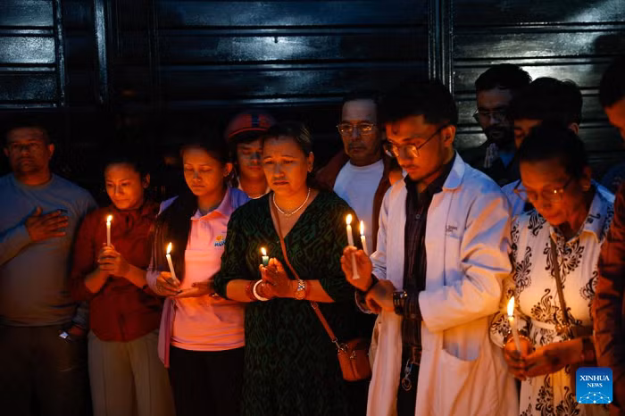 People attend a candlelight vigil for victims of protests over the previous days in Kathmandu, Nepal, Sept. 11, 2025. A peaceful rally turned violent in Kathmandu and other parts of the country on Monday and Tuesday, leaving 30 dead and more than 1,000 others injured by Wednesday, as reported by the Nepali Ministry of Health and Population. (Photo: Xinhua) 