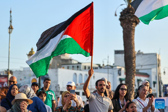 People holding Palestine flags attend a rally in support of Palestinians in Rabat, Morocco, July 31, 2025. (Photo: Xinhua)