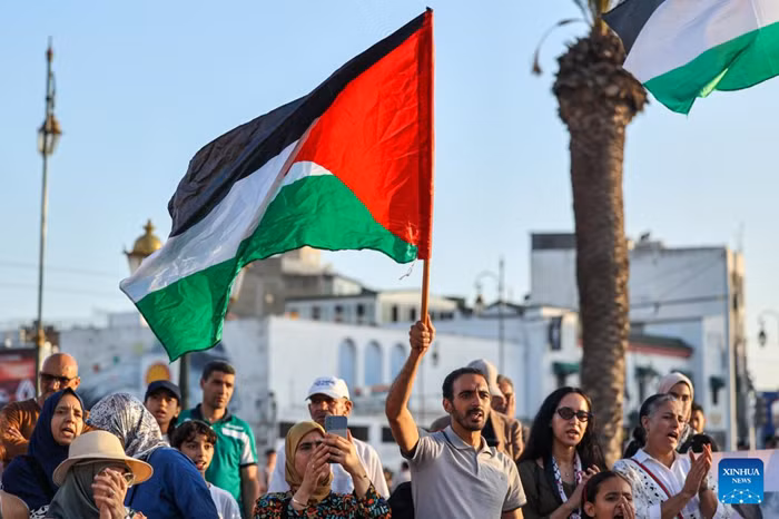 People holding Palestine flags attend a rally in support of Palestinians in Rabat, Morocco, July 31, 2025. (Photo: Xinhua)