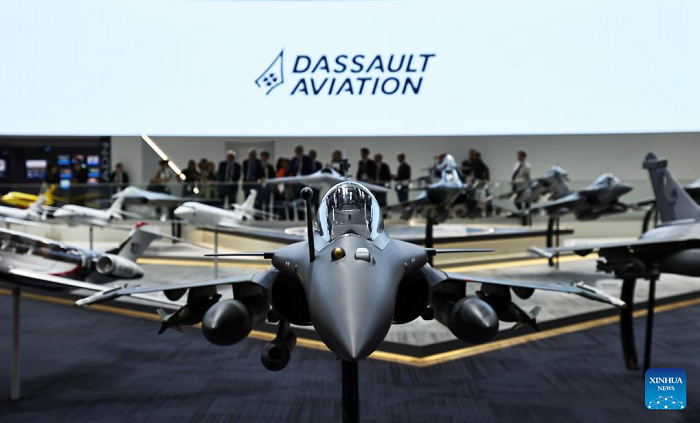 People visit the booth of Dassault Aviation during the 55th Paris Air Show at Le Bourget Airport near Paris, France, June 17, 2025. The 55th edition of the Paris Air Show officially opened on Monday and will run until June 22, with the participation of about 2,400 exhibitors from 48 countries and regions. (Photo: Xinhua)