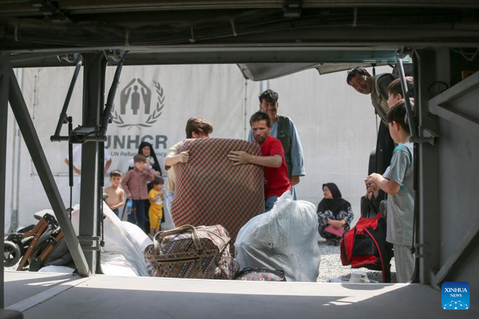 Newly arrived Afghan refugees settle in a temporary camp in Kabul, Afghanistan, Aug. 30, 2025. A total of 2,844 Afghan refugee families, totaling 13,662 individuals, returned to Afghanistan from Iran and Pakistan on Thursday, Afghanistan's High Commission for Addressing Returnees Problems announced Friday. (Photo: Xinhua)