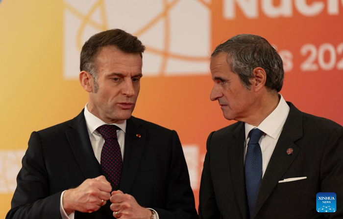 French President Emmanuel Macron talks with International Atomic Energy Agency Director General Rafael Grossi before the second Nuclear Energy Summit in Paris, France, on March 10, 2026. Macron on Tuesday called on both public and private sectors to step up investment in the development of civil nuclear energy. (Photo: Xinhua)