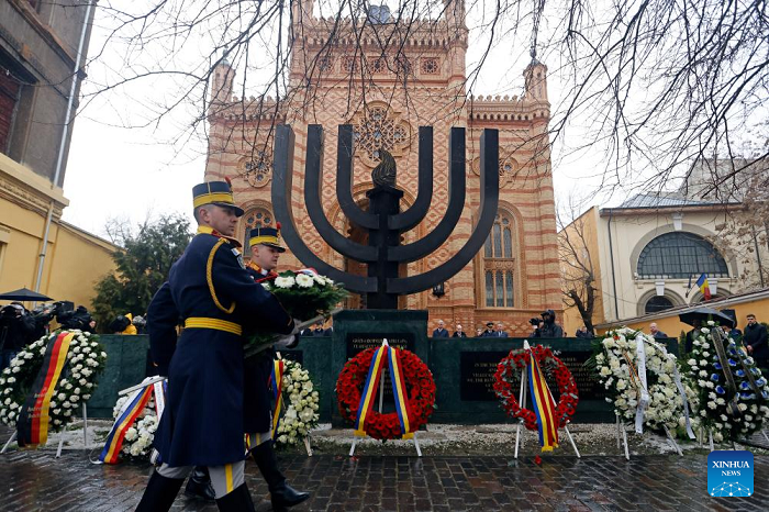 Soldiers attend a wreath-laying ceremony commemorating Holocaust victims at the Choral Temple on the occasion of International Holocaust Remembrance Day in Bucharest, Romania, on Jan. 26, 2026. January 27 is designated by the United Nations as International Holocaust Remembrance Day, a time to remember the six million Jews who perished in the Holocaust during the Second World War. (Photo: Xinhua)