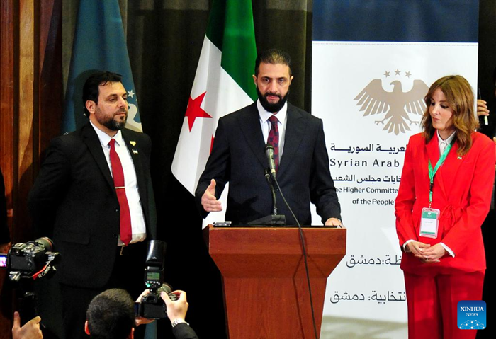 Syrian leader Ahmed al-Sharaa (C) is pictured at a voting site for the election of Syria's new legislature in Damascus, Syria, Oct. 5, 2025. Syria's transitional authorities on Sunday launched the country's first parliamentary elections since the fall of former President Bashar al-Assad last December, marking a new stage in the country's post-conflict political transition. (Photo: Xinhua)