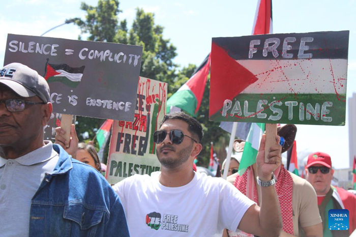 People take part in a mass march in support of the people of Gaza, in Cape Town, South Africa on Sept. 27, 2025. Thousands of South Africans took to the streets of Cape Town, the country's legislative capital, on Saturday for a mass march in support of the people of Gaza, demanding stronger government action in response to the ongoing Israeli military campaigns there. (Photo: Xinhua)