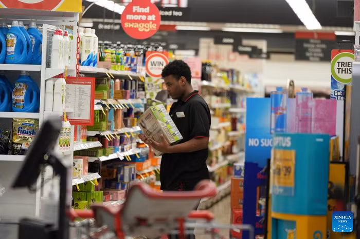 A store worker restocks shelves in Tuggeranong shopping center, in Canberra, Australia, on Sept. 18, 2025. Australia's unemployment rate remained steady at 4.2 percent in August despite a fall in full-time employment. (Photo: Xinhua)