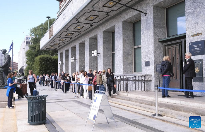 People queue to vote outside the Oslo City Hall in Oslo, capital of Norway, on Sept. 8, 2025. Norwegians headed to the polls on Monday to elect all 169 members of the Storting, the country's unicameral parliament, across 19 multi-member constituencies. (Photo: Xinhua)