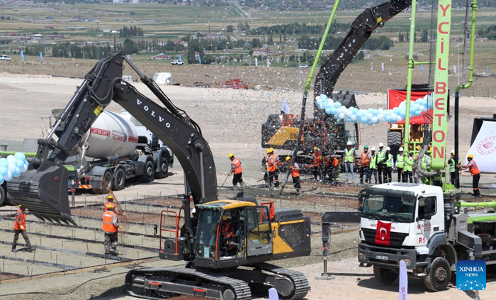 People attend a groundbreaking ceremony for a railway in Igdir, northeast Türkiye, on Aug. 22, 2025. Türkiye on Friday held a groundbreaking ceremony for a railway linking its northeastern Kars province with Azerbaijan's Nakhchivan exclave. (Mustafa Kaya/Handout via Xinhua)