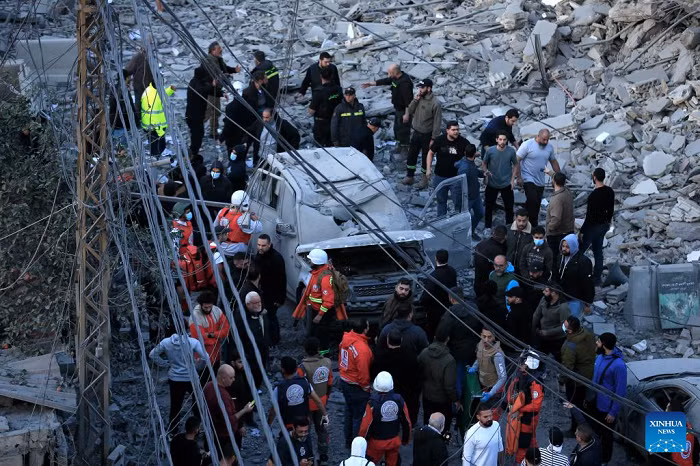 Rescuers work at the site of the Islamic Group's offices destroyed by Israeli airstrikes in Sidon, southern Lebanon, March 3, 2026. (Photo: Xinhua)