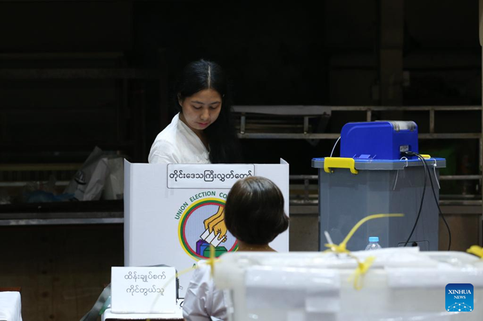 A voter casts her vote at a polling station in Yangon, Myanmar, Jan. 25, 2026. The final phase of Myanmar's multi-party democratic general election began on Sunday morning, with polling stations opening in about 60 townships. (Photo: Xinhua)
