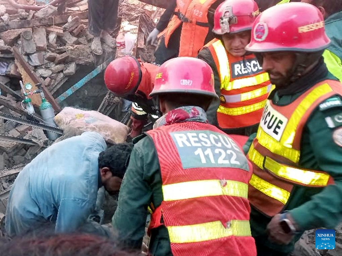 Rescuers work at the explosion site of a chemical factory in Faisalabad, Punjab province, Pakistan, Nov. 21, 2025. Twelve people were killed and scores of others injured on Friday morning when a boiler exploded at a chemical factory in a residential locality in Pakistan's eastern Punjab province, police sources said. (Photo: Xinhua)