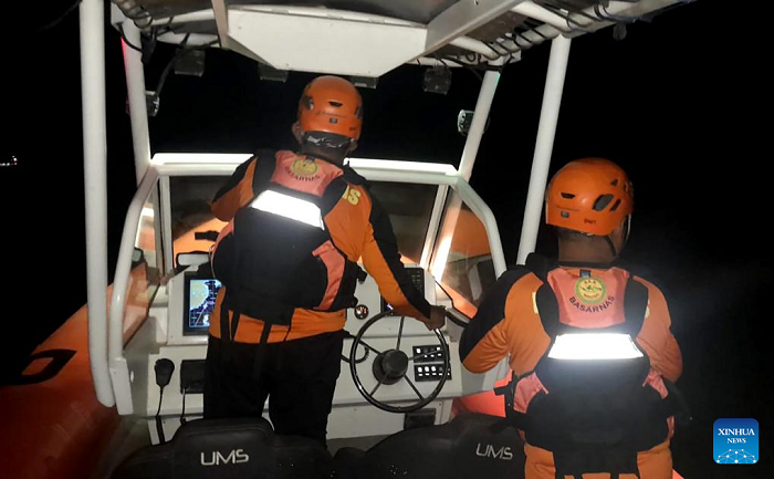 Rescuers search for missing passengers of a ship capsizing near Bali Island, Indonesia, July 3, 2025. At least four people were killed, 31 others survived, and 30 remain missing after a wooden passenger ship capsized near Indonesia's Bali Island before midnight on Wednesday, a senior rescue official confirmed Thursday, as rescuers raced to find victims in the rough sea.
