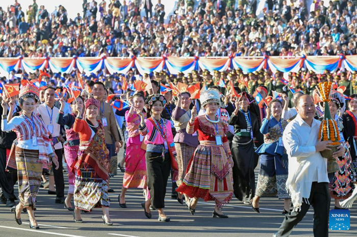 This photo taken on Dec. 2, 2025 shows a scene during an event in Vientiane to celebrate the 50th anniversary of the founding of the Lao People's Democratic Republic. A grand mass march and a military parade were held in Vientiane on Tuesday. (Photo: Xinhua)
