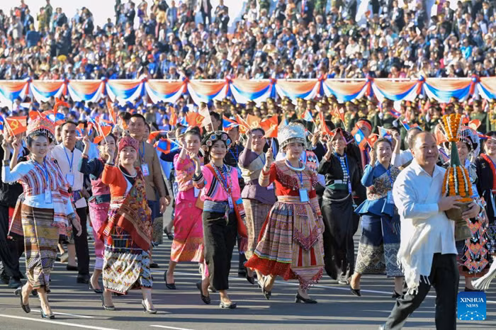 This photo taken on Dec. 2, 2025 shows a scene during an event in Vientiane to celebrate the 50th anniversary of the founding of the Lao People's Democratic Republic. A grand mass march and a military parade were held in Vientiane on Tuesday. (Photo: Xinhua)