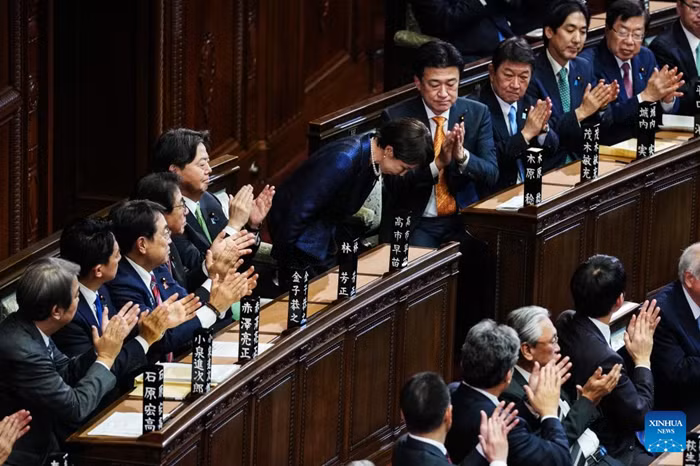 Takaichi Sanae (C) bows after winning Japan's prime ministerial designation vote in the House of Representatives in Tokyo, Japan, Feb. 18, 2026. Takaichi Sanae, president of Japan's ruling Liberal Democratic Party, was elected as the country's 105th prime minister on Wednesday by lawmakers in parliament. (Photo: Xinhua)