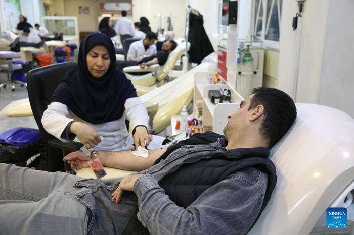 A man donates blood at a blood center in Tehran, Iran, on March 7, 2026. (Photo: Xinhua)