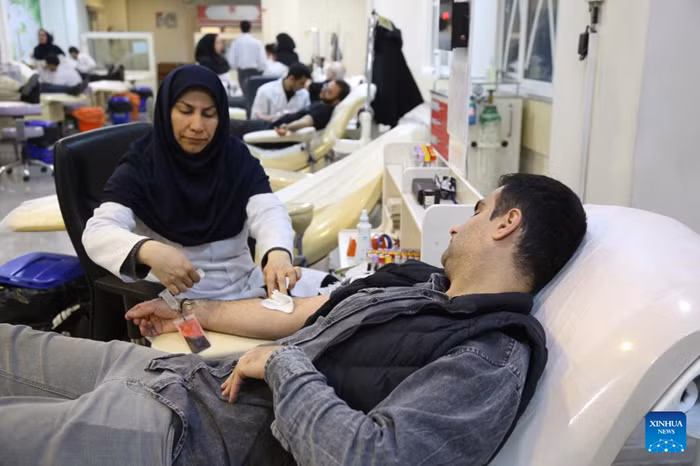 A man donates blood at a blood center in Tehran, Iran, on March 7, 2026. (Photo: Xinhua)