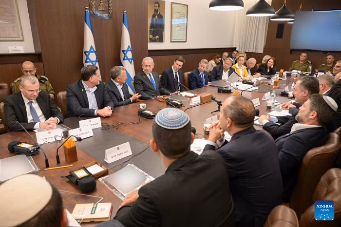 Israeli Prime Minister Benjamin Netanyahu (5th L, rear), U.S. Special Envoy to the Middle East Steve Witkoff (4th L, rear) and U.S. President Donald Trump's son-in-law Jared Kushner (6th L, rear) attend a government meeting in Jerusalem on Oct. 9, 2025. The Israeli government on early Friday approved a ceasefire deal with Hamas to end the war in Gaza and secure the release of all remaining hostages. (Ma'ayan Toaf/GPO/Handout via Xinhua)
