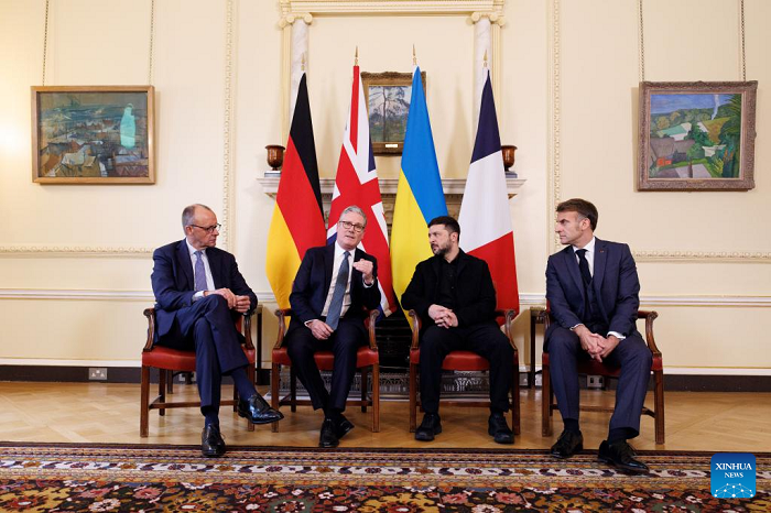 British Prime Minister Keir Starmer (2nd L), Ukrainian President Volodymyr Zelensky (2nd R), French President Emmanuel Macron (1st R) and German Chancellor Friedrich Merz make remarks as they meet in 10 Downing Street in London, Britain, Dec. 8, 2025. (Lauren Hurley/No. 10 Downing Street/Handout via Xinhua)