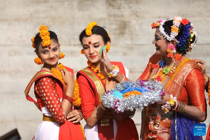 Women take part in the celebration of the Pahela Falgun festival in Dhaka, Bangladesh, Feb. 14, 2026. The first day on the eleventh month of the Bengali calendar marks the Pahela Falgun festival, during which people celebrate the beginning of the spring. (Photo: Xinhua)