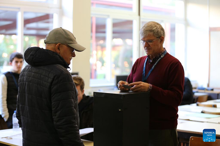 A voter casts his ballot at a polling station in Lisbon, Portugal, Jan. 18, 2026. Portugal's presidential election will head to a second round after no candidate secured an outright majority in Sunday's first round, according to data released by the General Secretariat of the Ministry of Internal Administration. Based on 95.7 percent of the votes counted, Seguro and Ventura will enter the runoff scheduled for Feb. 8 as the leading candidates. The winner will be determined by a simple majority. (Photo: Xinhua)