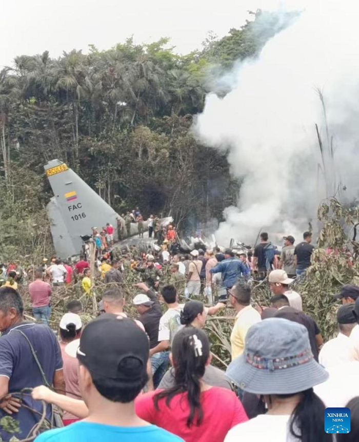 People gather near a military aircraft crash site in the province of Putumayo, Colombia, March 23, 2026. The death toll from a Colombian military aircraft crash in southern Colombia's Putumayo region has risen to 66, with 57 others injured, local media reported on Monday, citing military sources. (Photo: Xinhua)
