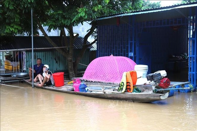 Many houses in Vinh Hoan hamlet, Con Cuong commune, are flooded as the Lam River's water level continues to rise. (Photo: VNA) Many houses in Vinh Hoan hamlet, Con Cuong commune, are flooded as the Lam River's water level continues to rise. (Photo: VNA)