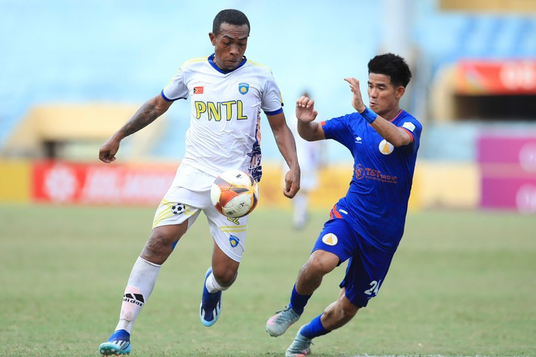 Timor-Leste (in white) pressing forward in attack. bd1.jpg